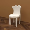 White Upholstered Dining Chair With Unique Backrest Rounded Legs Against Brown Wall Herringbone Wood Floor