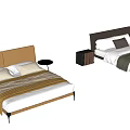 Double Bed With Dark And Beige Headboards White Sheets Pillows Blankets And Nightstand