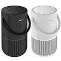 Dual Bose Black And White Portable Speakers With Handle And Cylindrical Design