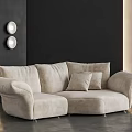 Contemporary Living Room With Beige Fabric Irregular Shaped Sofa And Wall Lighting
