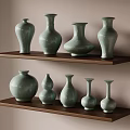 Multiple Turquoise Ceramic Vases in Various Shapes Displayed on Wooden Shelves