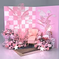 Pink Themed Decorative Setup With Checkerboard Wall Flamingo Chair Flowers And Clouds