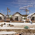Scenic Desert Campsite With White Tents Palm Trees And Outdoor Lanterns