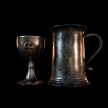 Vintage Silver Metal Cups Including Mugs And Goblets On Reflective Surface 3d model