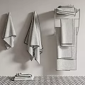 Soft Textured Bath Towels Hanging On Wall And Rack In Modern Bathroom