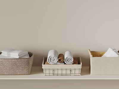 Different Storage Baskets With Rolled Towels On Beige Shelf For Home Organization 3d model