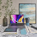 Modern Laptop With Colorful Screen Coffee Cup Notebook Phone And Plant