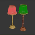 Two Gold Table Lamps With Mesh Shades Bamboo Poles And Textured Bases On Black Background