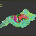 3D Terrain Model Showcasing Natural Landscape Features With Green Vegetation And Blue Water