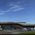 Modern White Cultural Center Building With Streamlined Design And Glass Facade