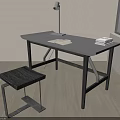 Black Desk With Table Lamp Books And Stool Near Window On Wooden Floor