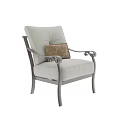 Elegant Leisure Chair With Light Blue Cushion Patterned Pillow And Curved Dark Armrests