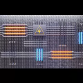 Detailed Electronic Circuit Board Design With Lightning Warning Symbol And Colored Lines