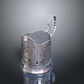 Elegant Silver Household Container With Intricate Carved Patterns And Perforated Decorative Handle