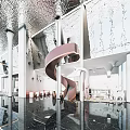 Modern Front Desk Reception Area With Pink Spiral Staircase And Sleek Interior Decor