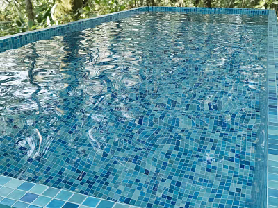 Beautiful Swimming Pool With Blue Mosaic Tiles Rippling Water And Green Plants 3d model