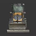Yellow Small Loader With Front Bucket Placed On Concrete Platform Industrial Machinery
