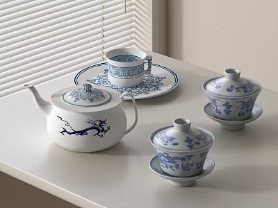 Traditional Blue and White Tea Set with Teapot Cups and Saucers on Tabletop 3d model