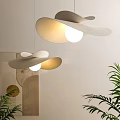 Modern Pendant Light With Curved Leaf Shaped Shades And Soft Warm Glow For Interior Decoration