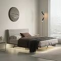 Double Bed with White Headboard Brown Pillow Gray Blanket Round Side Table and Floor Lamp