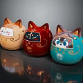 Adorable Round Cat Dolls In Brown Red Blue With Intricate Facial And Golden Patterns