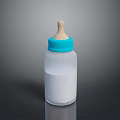 White Baby Bottle With Blue Cap And Wooden Nipple Containing Liquid For Feeding