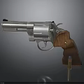Close Up Of Classic Revolver With Silver Metal Body Wooden Grip And Bullet
