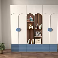 Modern White and Blue Wardrobe with Round Blue Accents Open Shelves and Decorative Items