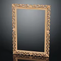 Classic Ornate Golden Picture Frame Featuring Intricate Carvings On Dark Background