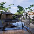 Rockery Stones In Traditional Garden With Lush Green Plants And Pond
