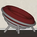 Modern Red Leather Lounge Chair With Circular Layered Rings And Metal Frame Design