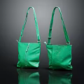 Two Green Leather Handbags With Long Shoulder Straps And Zipper Detail On Dark Background