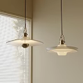 Modern Pendant Lights With White Lampshade And Metallic Frame Design In Indoor Space