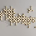 Modern Minimalist Wall Decor With Ivory Circular Ceramic Beads In Geometric Arrangement