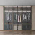 Modern Sleek Wardrobe Interior Design With Glass Doors Hanging Clothes And Storage Drawers