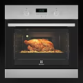 Modern Electric Oven Cooking Roast Chicken with Potatoes as Essential Kitchen Appliance