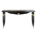 Elegant Black and Gold Table with Ornate Legs and Polished Top Surface Design
