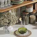 Elegant Kitchenware Display On Shelves With Bowls Jars Bottles And Green Plants Against Brick Wall
