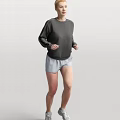 Woman Running In Dark Sweatshirt And Light Gray Shorts With Active Pose