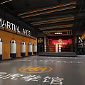 Martial Arts Training Gym Spacious Interior With Hanging Punching Bags And Boxing Ring