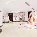 Bridal Shop Interior With Balloon Arch LOVE Decor And Various Wedding Dresses