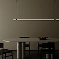 Modern Minimalist Dining Table Set With Round White Table Black Chairs And Hanging Pendant Light