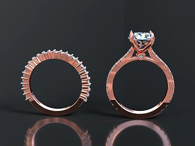 Elegant Rose Gold Rings Featuring Diamond Centerpiece And Decorative Band 3d model