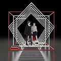 Geometric Frame Photo Spot With Illuminated Lines Red Borders And Two People Posing