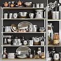 Modern Kitchen Cookware Collection On Shelves With Stainless Steel Utensils And Pots
