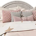 Modern Bedroom Setup With Upholstered Bed Frame And Decorative Pillows