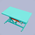 Green Tabletop Scissor Lift Table With Orange Mechanism And Wheel Base
