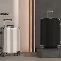 Modern Stylish Silver And Black Suitcases With Trolley Handles And Rolling Wheels