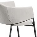 Modern Round Table With Four Beige Fabric Chairs And Black Metal Legs