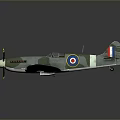 Detailed Spitfire Model Airplane with Green Camouflage Paint and RAF Roundels on Dark Background